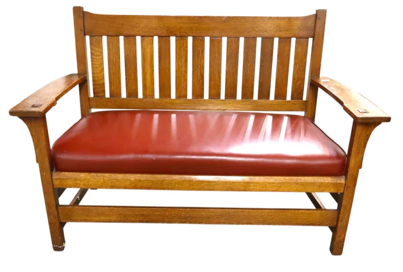 Antique L & J.G. Stickley slat back oak arm bench from auction in Logan Township, New Jersey