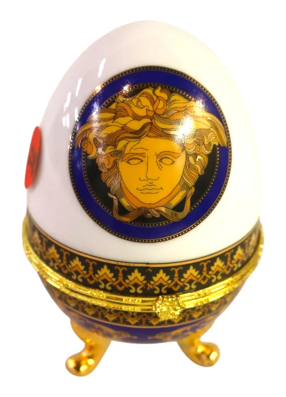 Vintage Versace Porcelain Tri-Footed Egg from auction in Logan Township, New Jersey