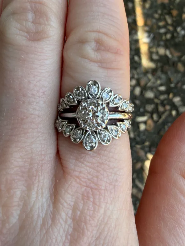 Unique floral-inspired halo design Engagment Ring from auction in Springfield, Missouri