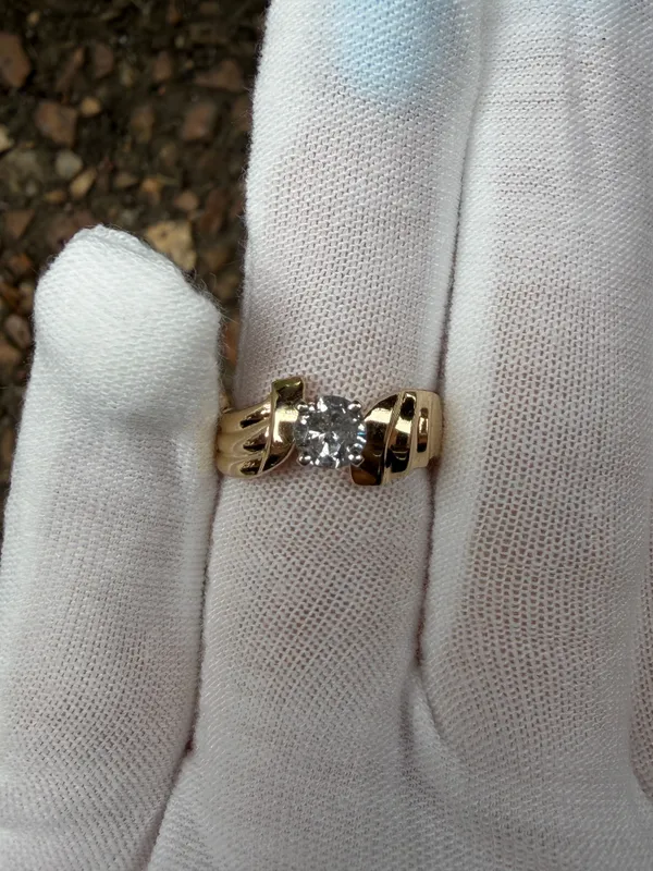 .54 ct center diamond in a unique sculpted setting ring from auction in Springfield, Missouri