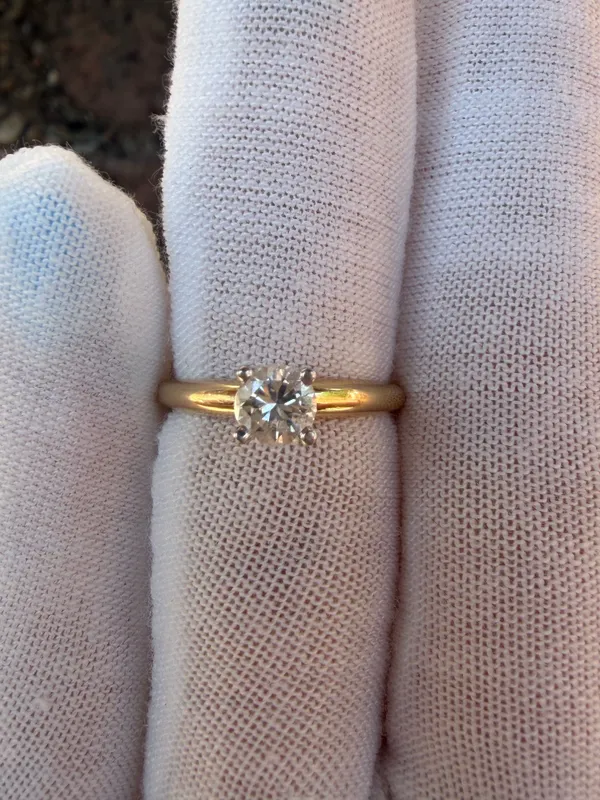 Solitaire engagement ring features a sparkling .50 carat round diamond from auction in Springfield, Missouri