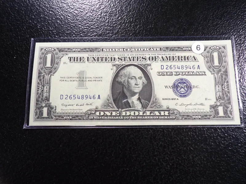 1957-A BLUE SEAL $1 SILVER CERTIFIACTE from auction in Englewood, Ohio