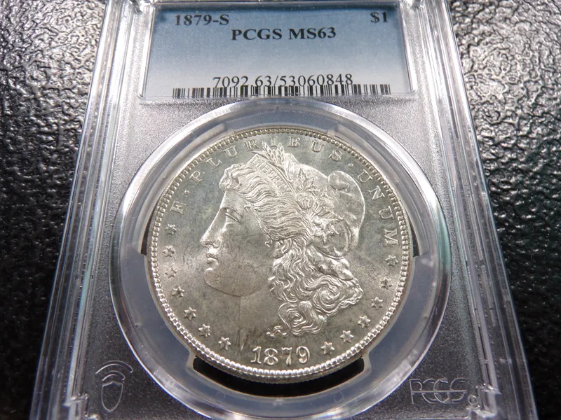 1879-S PCGS MS63 MORGAN SILVER DOLLAR from auction in Englewood, Ohio