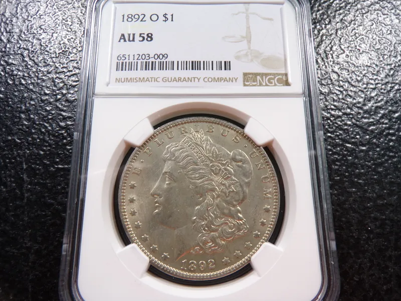 1892-O NGC AU58 MORGAN SILVER DOLLAR from auction in Englewood, Ohio