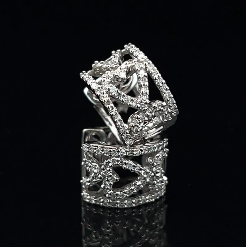 Natural Diamond Heart Cutout Huggie Hoop Earrings from auction in Port St Lucie, Florida