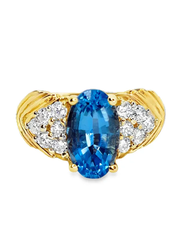 14K Blue Topaz & Diamond Ring from auction in Port St Lucie, Florida