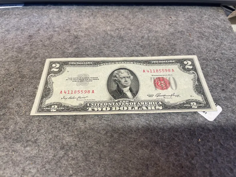 1953 Red Seal 2 dollar bill Uncirculated Very Fine  from auction in Brewton, Alabama