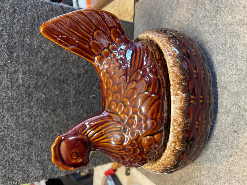 Hull Pottery Mirror Brown Drip Hen on Nest Casserole Dish from auction in Brewton, Alabama