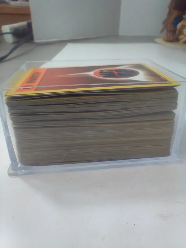 Assortment of Vintage Pokemon TCG Cards Including Fighting Energy 97/102 from auction in Brewton, Alabama