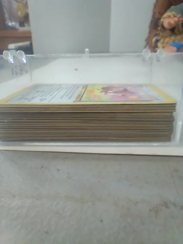 Collection of Vintage Pokemon Trading Cards in Clear Plastic Case from auction in Brewton, Alabama