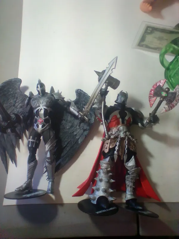 A Pair of TMP Intl. LLC Articulated Plastic Spawn Action Figures McFarlane Toys from auction in Brewton, Alabama