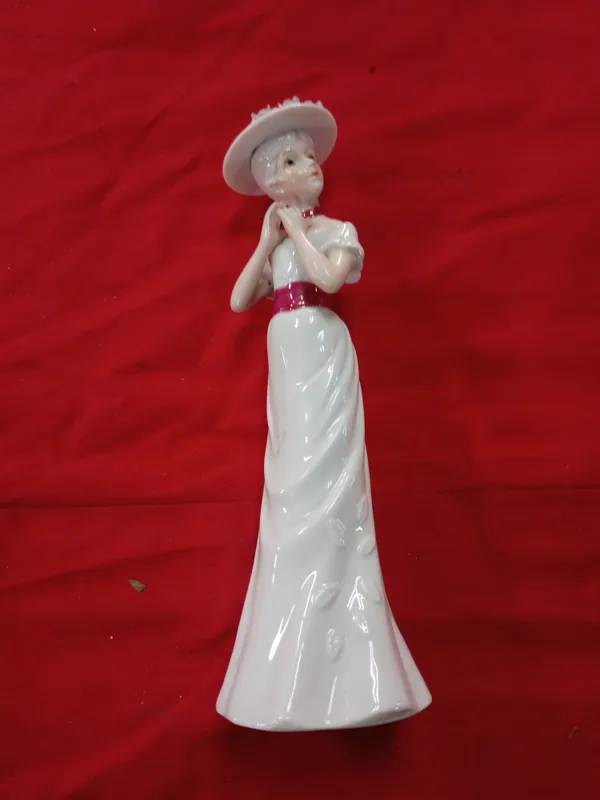Cemark International Hand Painted Porcelain Edwardian Lady Figurine from auction in Brewton, Alabama