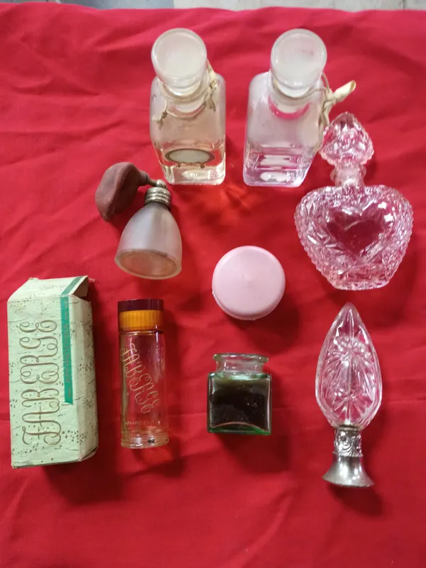 A Collection of Vintage Perfume Bottles and Vanity Glassware Including Fabergé and Avon from auction in Brewton, Alabama