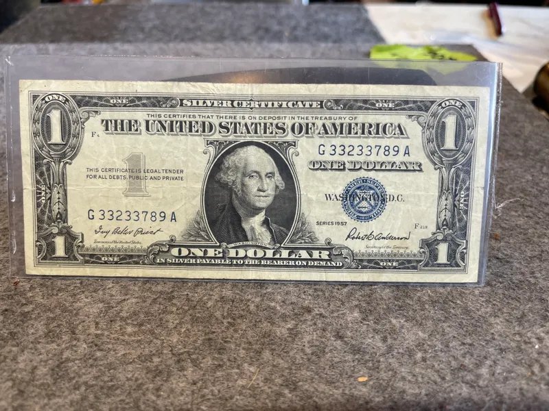 US $1 Silver Certificate, Series 1957 from auction in Brewton, Alabama