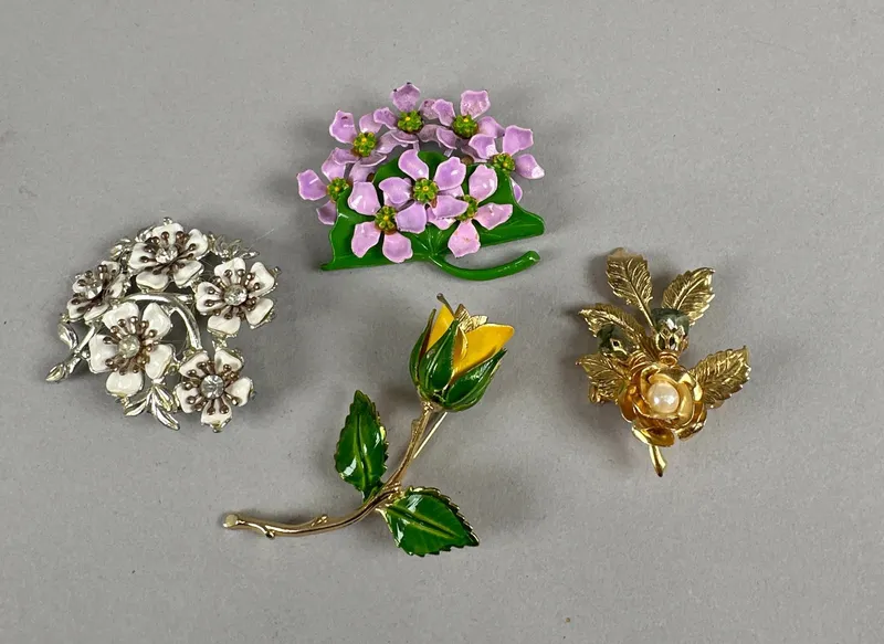 Collection of Four Vintage Enamel Flower Brooches from auction in Cranston, Rhode Island