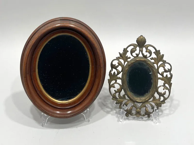 Two Oval Mirrors: Ornate Metal and Wood Frame from auction in Cranston, Rhode Island