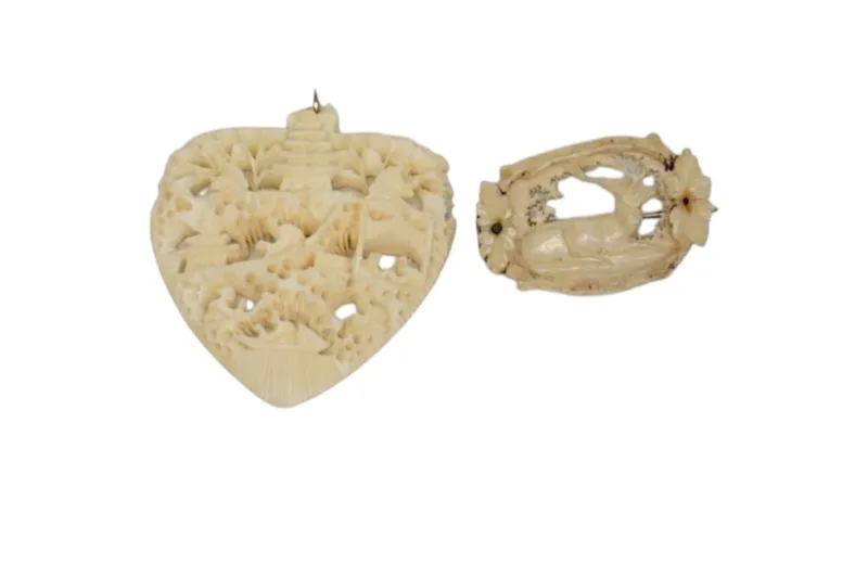 2 ANTIQUE CARVED BONE BROOCH & PENDANT from auction in Mount Pleasant, South Carolina