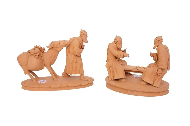 2 PIECE ITALIAN TERRACOTTA SCULPTURE FIGURINES from auction in Mount Pleasant, South Carolina