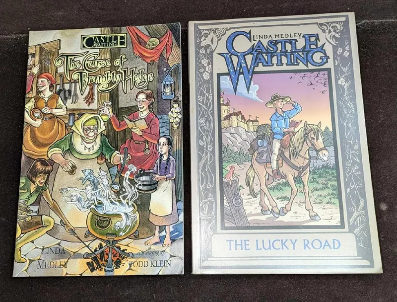 Two Castle Waiting Paperback Comic Books from auction in Orlando, Florida