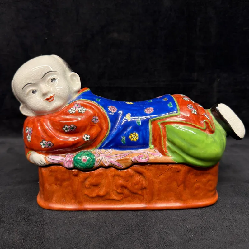 Hong Horizons Chinese Porcelain Reclining Child Covered Trinket Box from auction in Orlando, Florida