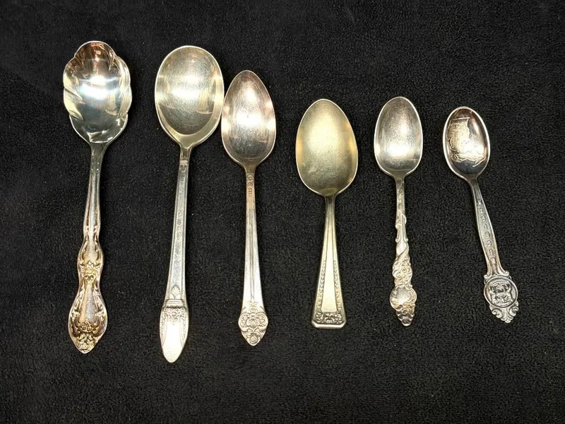 8 Vintage Silver Plated Spoons Souvenir & Flatware from auction in Orlando, Florida