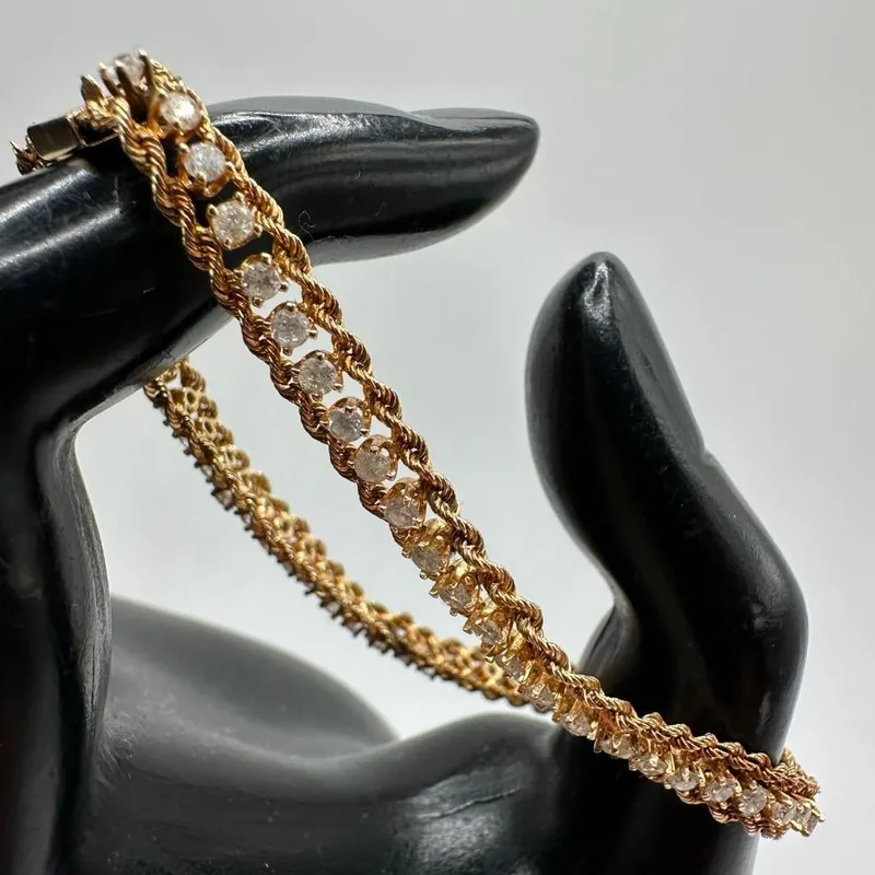 14k Gold Diamond Tennis Bracelet from auction in Orlando, Florida