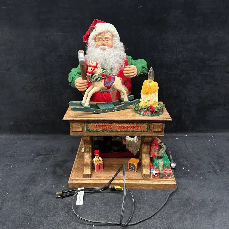 Animated Santa Workshop Christmas Display Figure with Lighted Candle from auction in Orlando, Florida