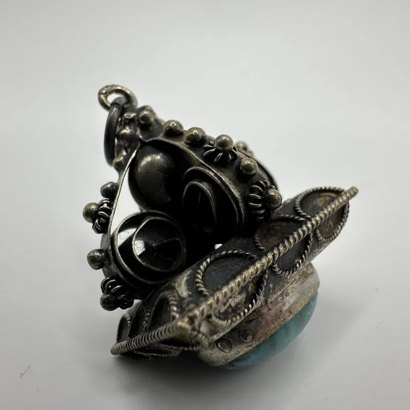 Chrysocolla Blue Stone Setting 800 Silver Ornate Silverwork Charm X69 from auction in Orlando, Florida