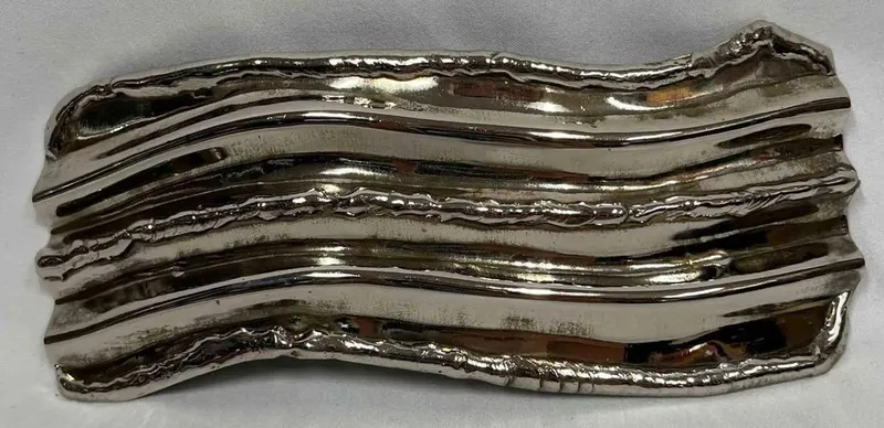 Large Vintage Metal Belt Buckle Made In India from auction in Orlando, Florida