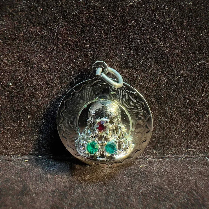 Spencer Sterling Silver Merry Christmas Bell Pendant from auction in Orlando, Florida
