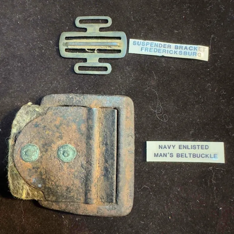 Civil War Relic Suspender Bracket and Navy Enlisted Men's Belt Buckle Set from auction in Orlando, Florida