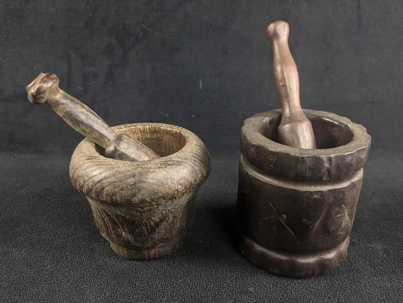 Hand Carved Wooden Mortar and Pestle Pair from auction in Orlando, Florida