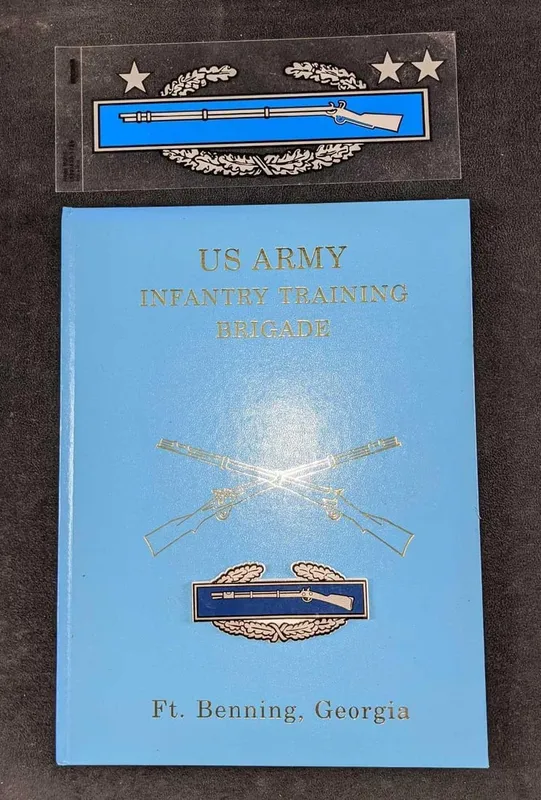Infantry Training Brigade Hardcover & Combat Infantryman Sticker & Magnet from auction in Orlando, Florida