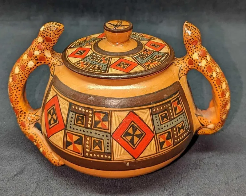 Hand Painted Peruvian Style Ceramic Pot With Lid from auction in Orlando, Florida