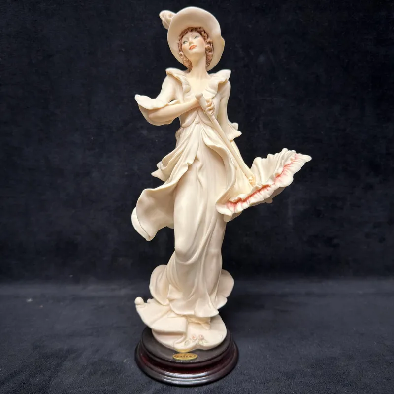 Giuseppe Armani Figurine Sun Shower 0656F Italy R240 from auction in Orlando, Florida