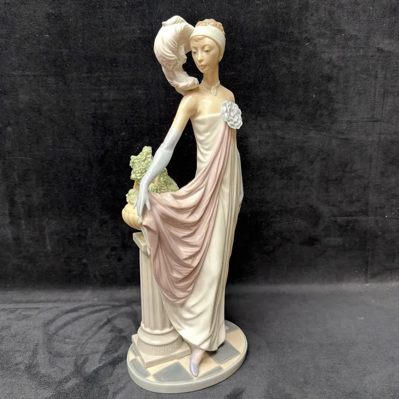 Lladro 5283 Elegant Lady with Pedestal Porcelain Figurine Socialite of the 20s from auction in Orlando, Florida