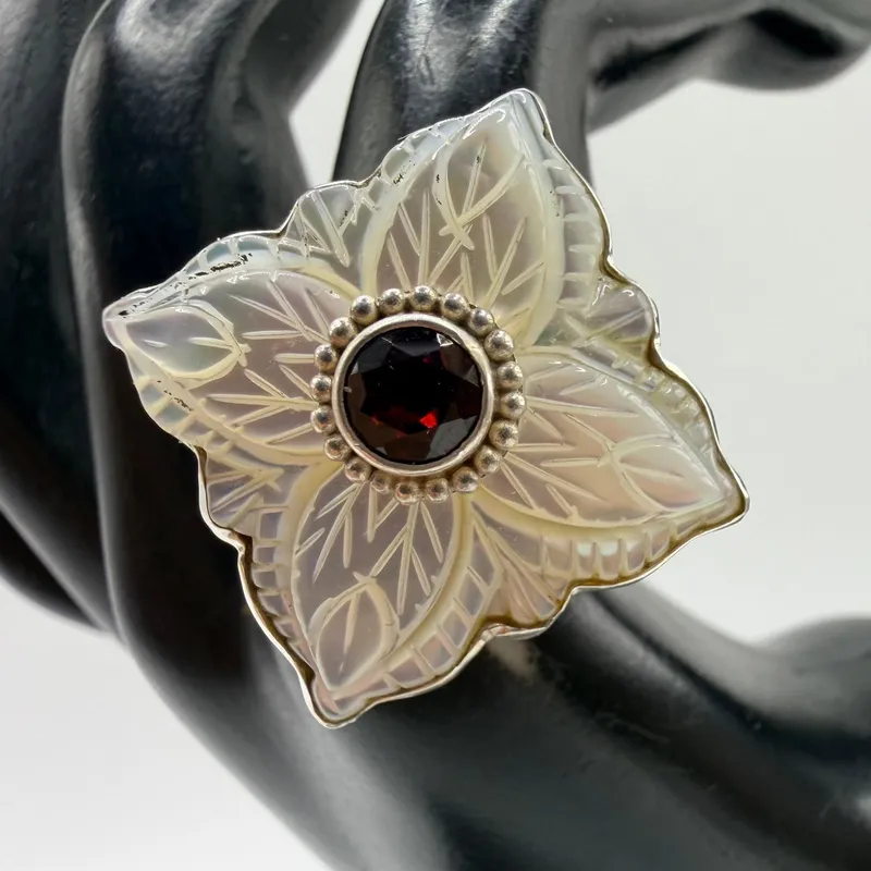 Sajen Sterling Silver Ring Carved Mother of Pearl Red Garnet from auction in Orlando, Florida