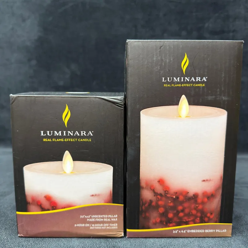 Lot of Two Luminara Real Flame Effect LED Pillar Candles New from auction in Orlando, Florida