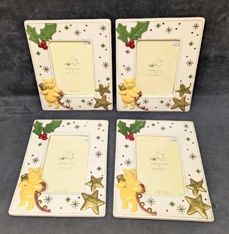 4 Disney Winnie The Pooh Porcelain Frames 4 x 6 Photos from auction in Orlando, Florida
