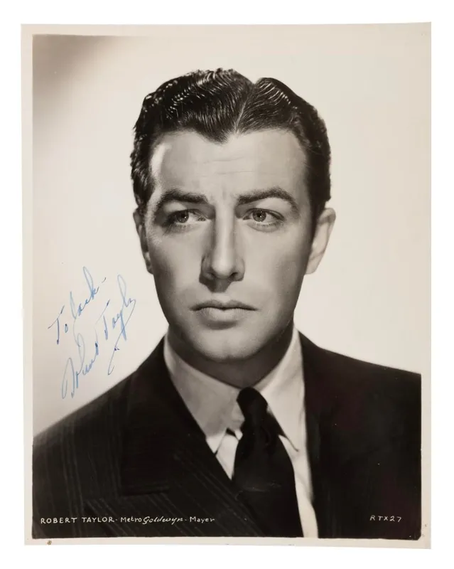 A Robert Taylor Signed Photograph. from auction in Studio City, California