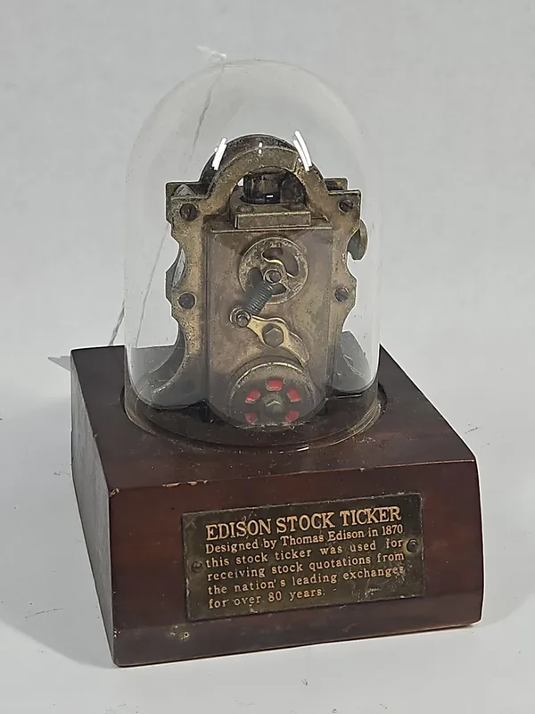 Edison Stock Ticker Brass Table Lighter from auction in Dundee, Ohio
