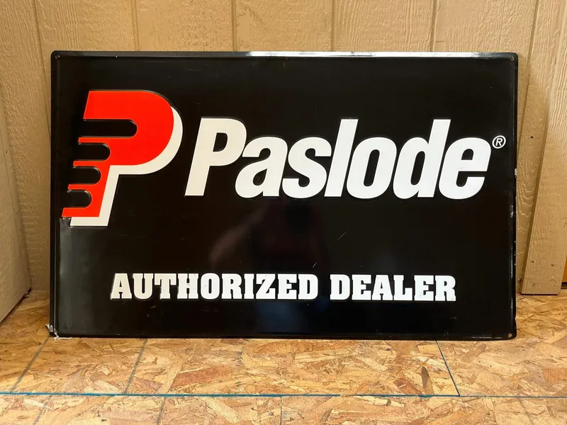 Paslode Embossed Metal Advertising Sign from auction in Dundee, Ohio