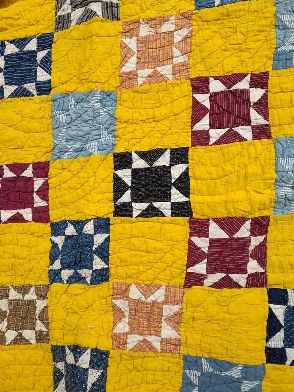 American Hand-Quilted Sawtooth Star Scrap Quilt from auction in Dundee, Ohio