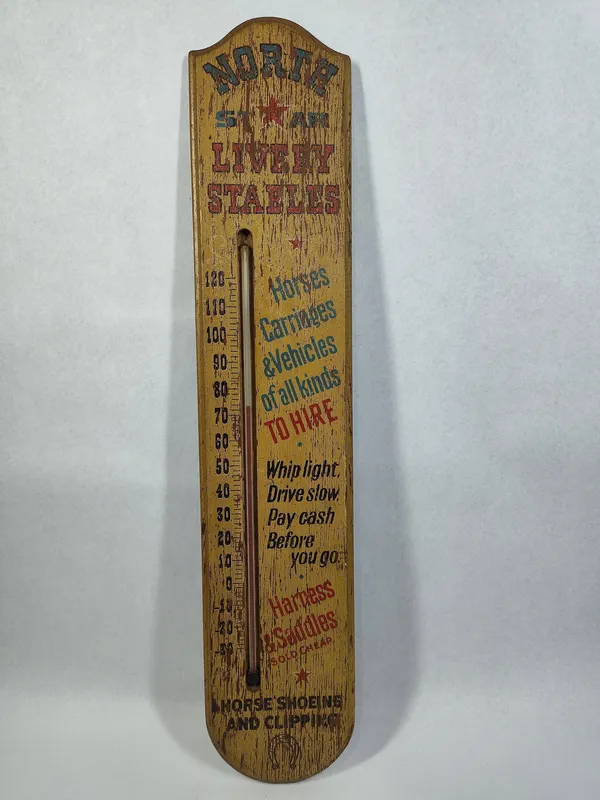 North Star Livery Adv. Wood Thermometer from auction in Dundee, Ohio