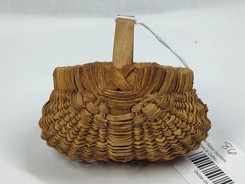 Splint Porcupine Weave Buttocks Basket from auction in Dundee, Ohio