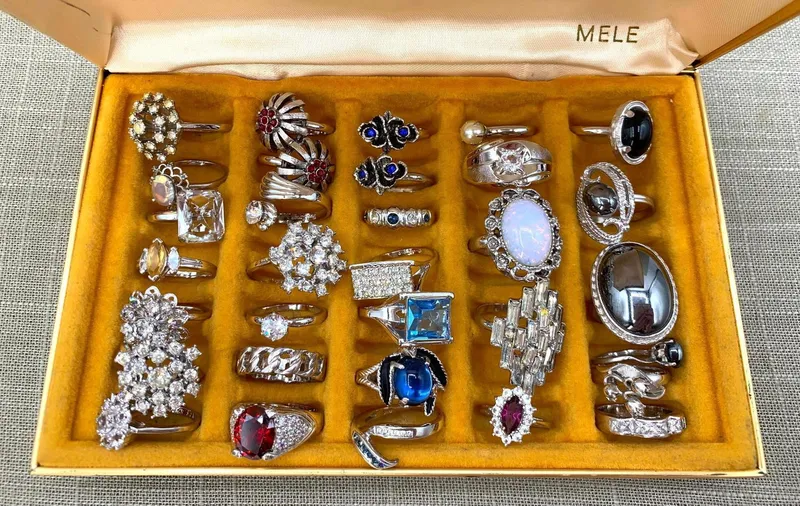 32 Mid Century PARK LANE, TRIFARI, SARAH COV, AVON, Dramatic Fashion Rings in MELE Ring Case from auction in Dundee, Ohio