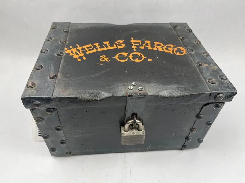 Wells Fargo & Co. Painted Wood and Metal Bound Strongbox from auction in Dundee, Ohio
