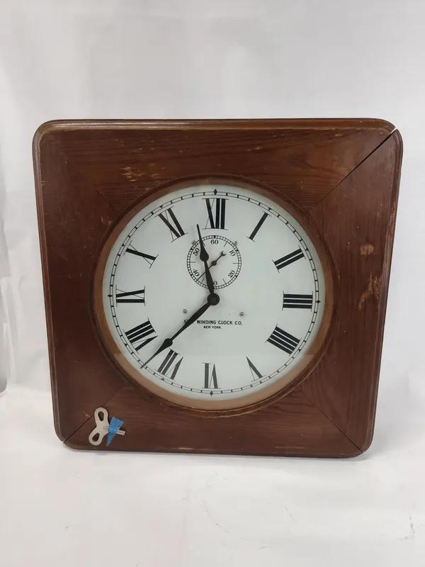 Self Winding Clock Co. Wood Wall Clock from auction in Dundee, Ohio