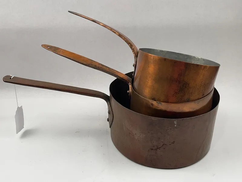 3 Dovetail Seam Copper Saucepans from auction in Dundee, Ohio
