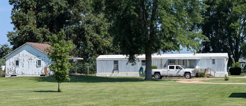 9.6 Acres - 2 Parcels - Mobile Home - Storage Building - Pond